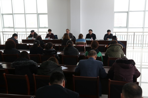 自治区残联党组书记理事长周俊林在学校教职工大会上讲话.jpg